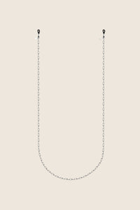 Elegancki łańcuszek do okularów z kolekcji LENS od UMIAR biżuteria, wykonany ze srebra. Długość 80 cm zapewnia wygodę i styl. Idealny dodatek, który łączy funkcjonalność z estetyką, pasuje do okularów przeciwsłonecznych i korekcyjnych. Kolekcja LENS to biżuteryjne łańcuszki z naturalnych pereł, minerałów i srebra, inspirowane dawnymi akcesoriami. Zamów teraz, aby dodać swoim okularom wyjątkowego uroku i zabezpieczyć je przed zgubieniem!